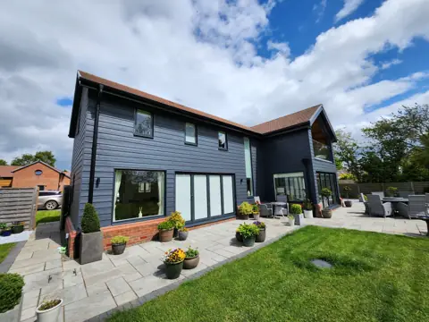 Cladding across a garden elevation — CG Cladding Solutions