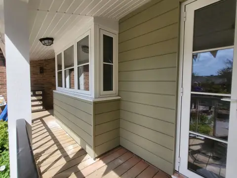 Cladding around a sheltered entrance — CG Cladding Solutions