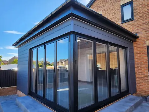 Cladding around a glazed extension — CG Cladding Solutions