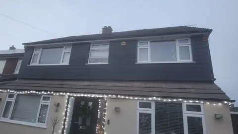 Dark cladding across an upper storey — CG Cladding Solutions