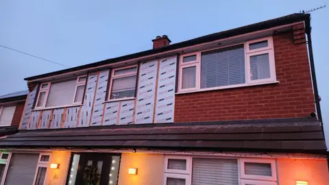 House-front installation in progress — CG Cladding Solutions