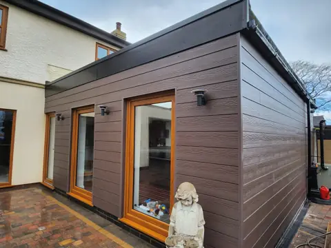 Cladding around a patio extension — CG Cladding Solutions